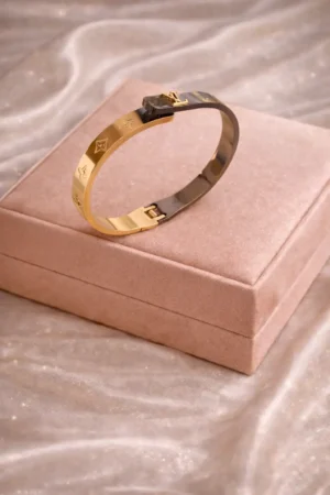 Gold-Finish Icon Engraved Lock Cuff Bracelet