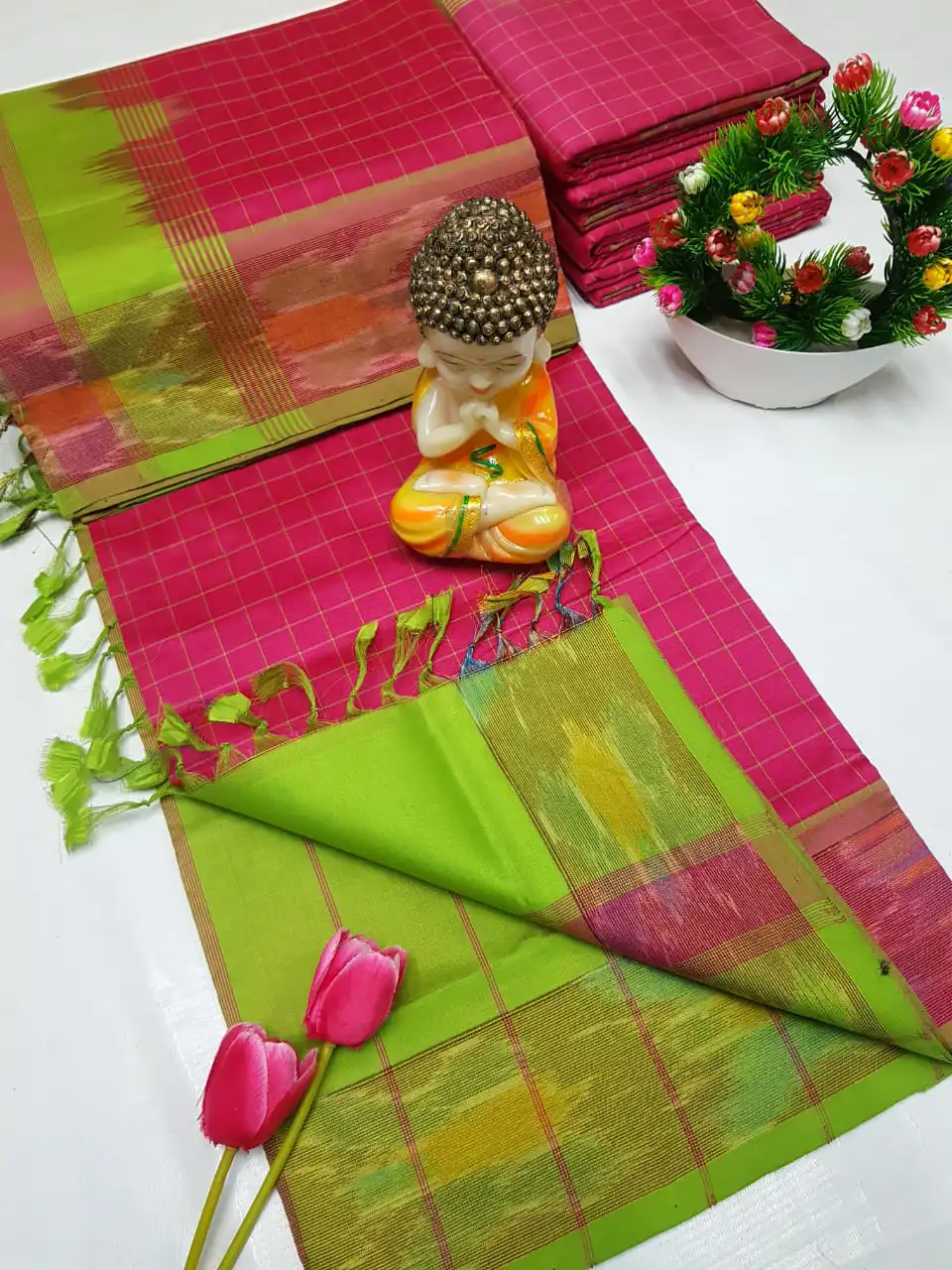 rani pink tripura silk mahanati checks saree with leaf green pochampally border