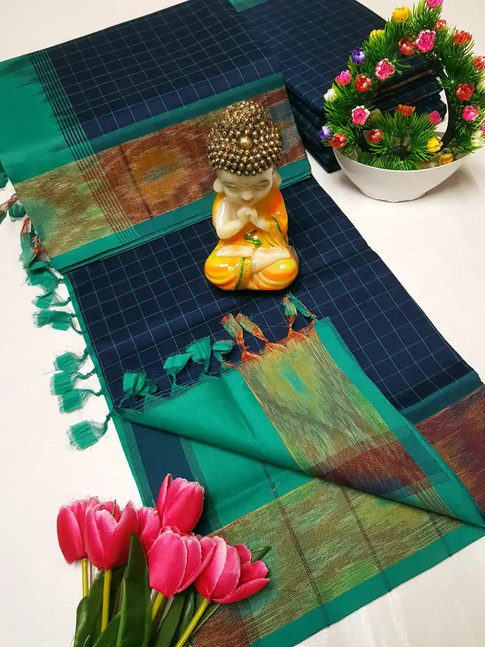 navy blue tripura silk mahanati checks saree with teal green pochampally border
