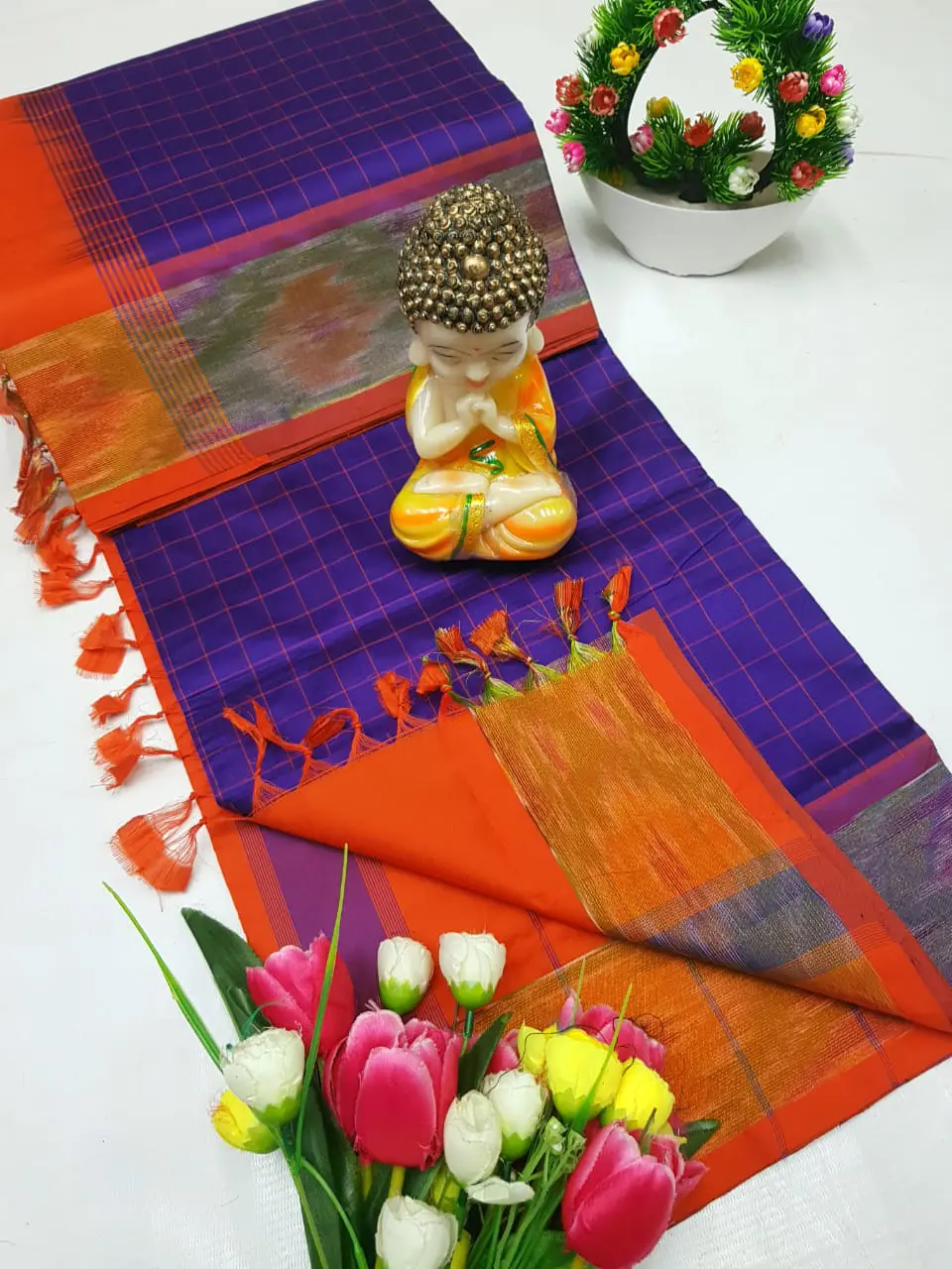 royal purple tripura silk mahanati checks saree with burnt orange pochampally border