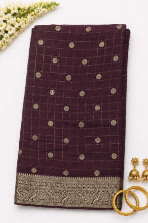 Wine colour Banaras Pattu saree with gold butta motifs and rich gold zari woven border