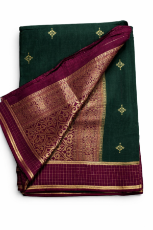 Elegant bottle green Banarasi soft silk saree with delicate gold motifs, a rich wine purple zari border, and a luxurious woven pallu.