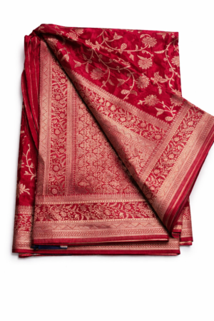 Graceful deep red banaras silk saree featuring delicate floral embroidery and a refined border for a rich designer festive look.