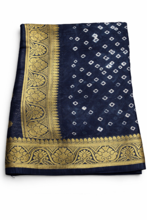 Elegant royal purple Bandhani saree featuring classic dotted motifs and rich gold zari woven borders for a timeless festive statement.