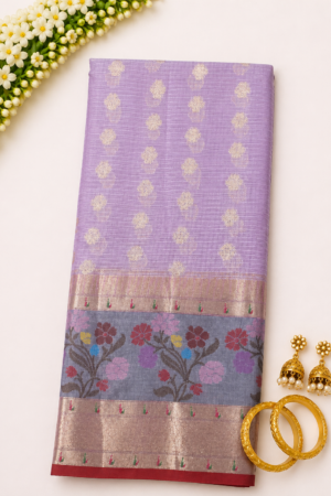 Pastel lavender Banaras Kota saree with woven butta motifs and rich floral zari border