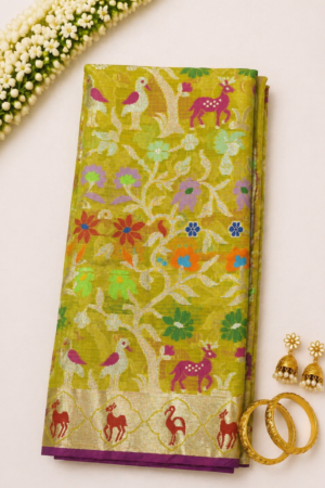 Mustard yellow Banaras Kota saree with artistic bird, deer, and floral woven motifs and rich nature-inspired border