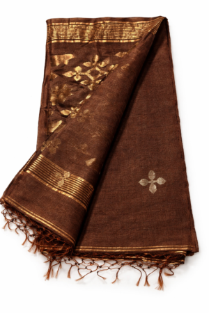 Elegant chocolate brown linen Jamdani saree highlighted with antique gold woven motifs, subtle metallic accents, and a tassel-finished pallu for timeless ethnic grace.