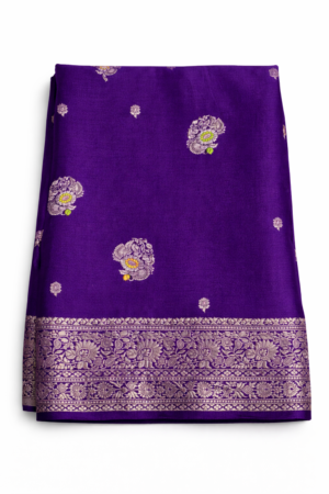 Elegant royal purple Chinon silk saree featuring delicate floral motifs and a rich woven floral border for a graceful festive look.