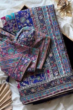 violet-purple crepe designer saree, where timeless grace meets modern glamour.