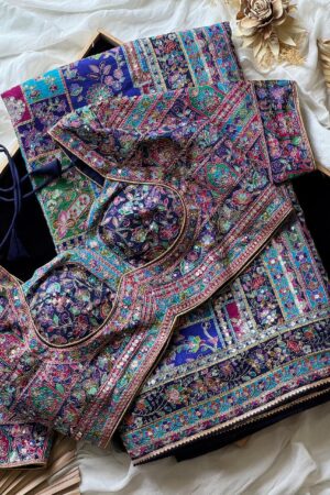 violet-purple crepe designer saree, where timeless grace meets modern glamour.