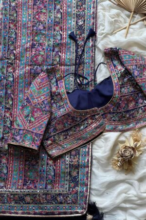 violet-purple crepe designer saree, where timeless grace meets modern glamour.