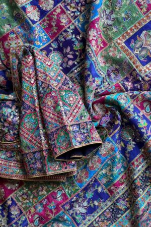 violet-purple crepe designer saree, where timeless grace meets modern glamour.