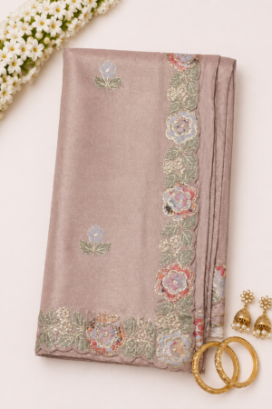 Dusty rose fancy tissue saree with floral embroidered scalloped border and delicate floral motifs