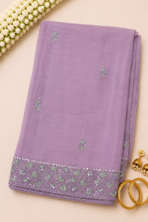 Lavender kardana work saree with scattered hand embellishments and richly embellished sequin border