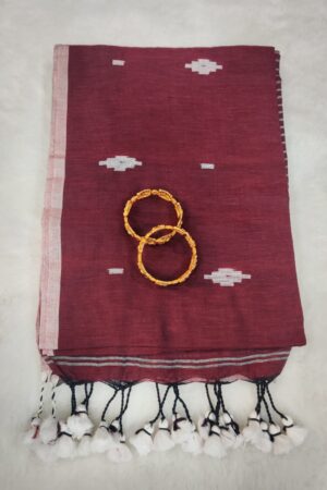 Elegant Maroon Linen Saree with White Woven Motifs, Contrast Border and Tassel Finish
