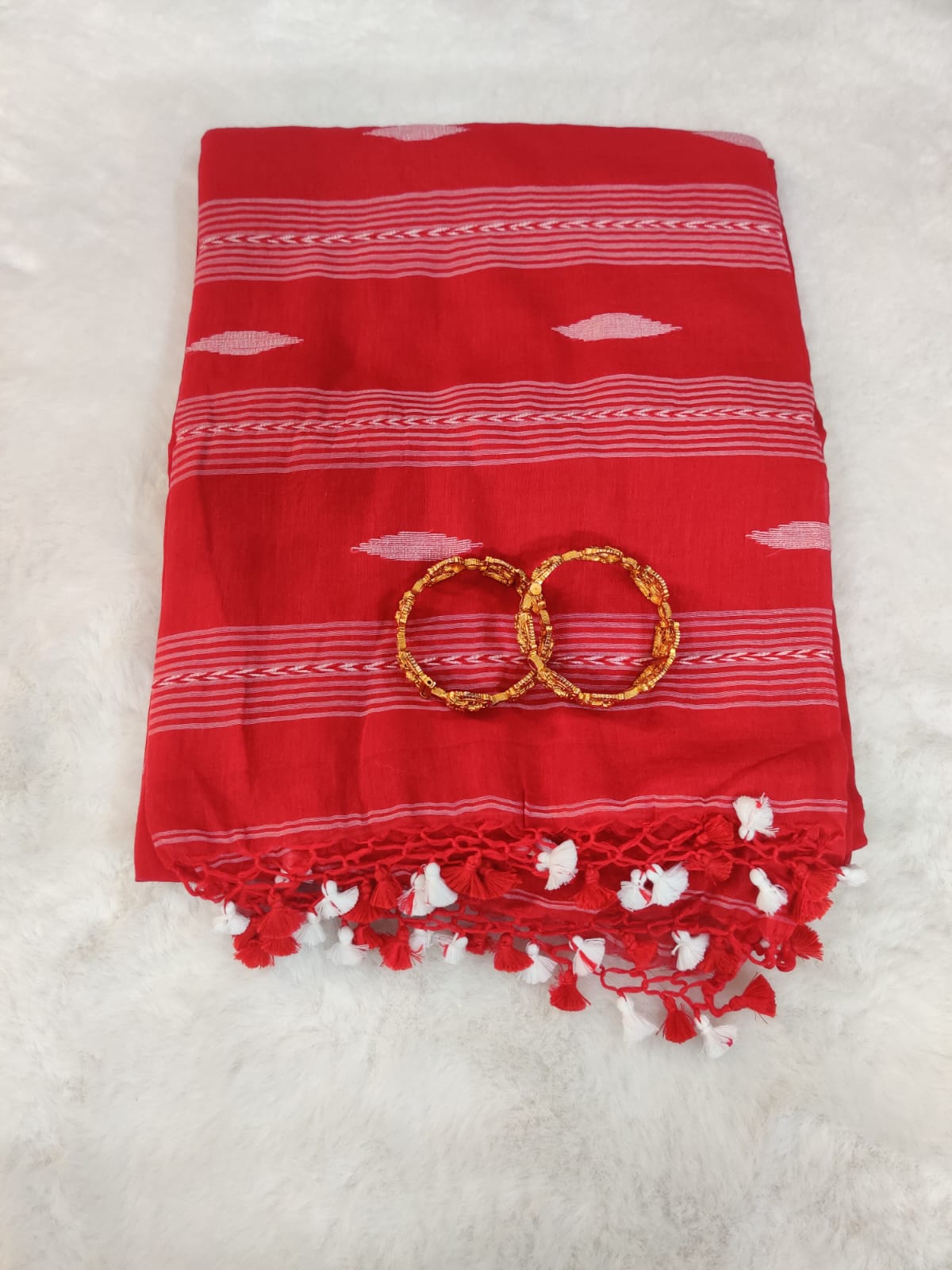 Elegant Red Linen Saree with White Woven Stripes, Minimal Motifs and Contrast Tassel Finish