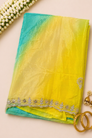 yellow and green maggam work saree with delicate embroidered motifs and elegant embellished border