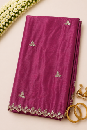 pink maggam work saree with delicate handwork motif and scalloped stone embellished border