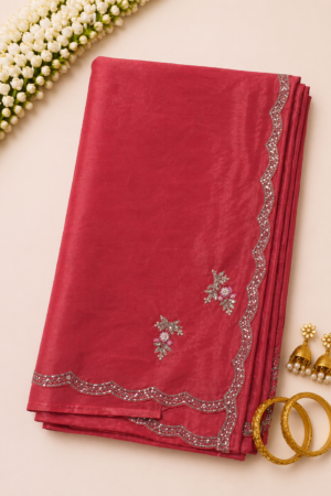 red maggam work saree with delicate handwork motif and scalloped stone embellished border
