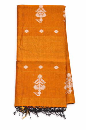 Orange cotton Jamdani saree featuring elegant white woven buti motifs, subtle zari-style highlights, and a graceful tassel finish for vibrant ethnic charm.