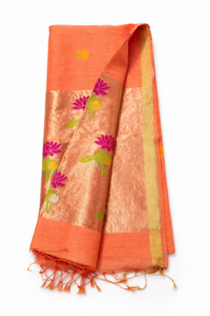 Elegant peach orange Jamdani fancy saree adorned with vibrant floral woven motifs, soft sheen, and tassel-finished pallu for graceful festive charm.