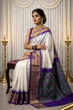 White Pochampally Ikat silk saree with purple contrast border, purple Ikat pallu, and zari woven detailing