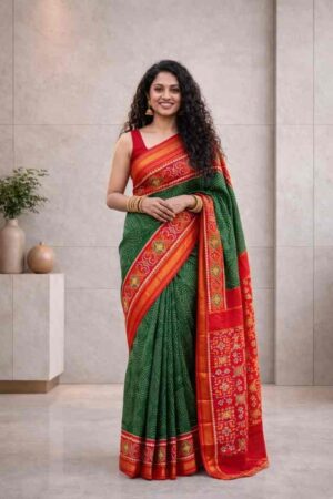 Green Pochampally Ikat saree with red contrast border and traditional woven pallu
