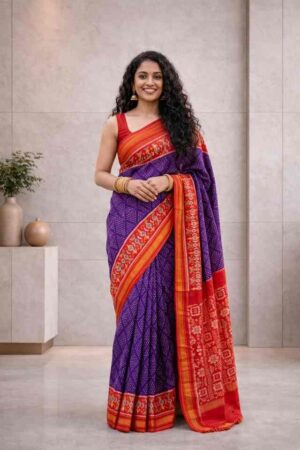 Purple Pochampally Ikat saree with red contrast border and traditional woven pallu
