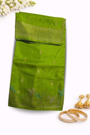 Elegant leaf green Russian silk saree featuring delicate silver buti motifs and an artistic bird woven border for a graceful festive look.