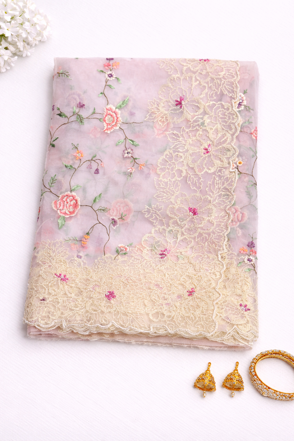 Lightweight Blush Pink Designer Tissue saree with hand embroidered Floral design